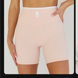 Brand new never worn with tags XS. ribbed pink high waste biker short white bows